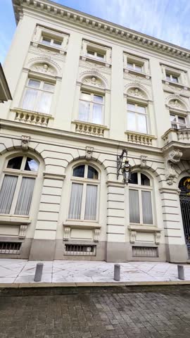 Grand white government building features impressive columns and a prominent entrance, making it an ideal venue for political or legal events that will leave a lasting impression. Brussels, Belgium