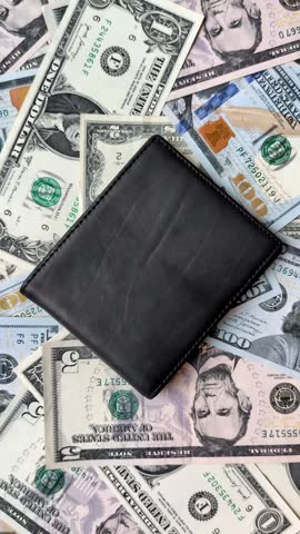 USA money, cash paper dollars, american business and financial transactions. Cash dollars in bills of different denominations as a conceptual background