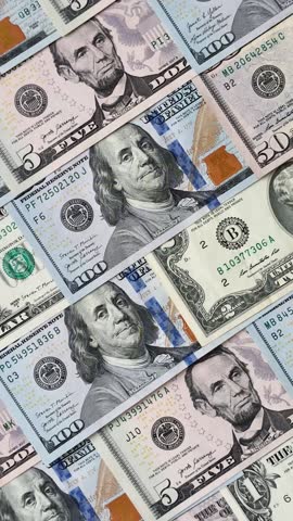 USA money, cash paper dollars, american business and financial transactions. Cash dollars in bills of different denominations as a conceptual background
