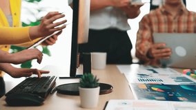 A vibrant office scene showcasing a diverse group of professionals engaged in technology and data analysis. Emphasizing collaboration, creativity, and productivity. SACTR - Powered by Shutterstock - Get 15% off with code: PIKWIZARD15