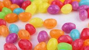 Many colorful fruit jelly beans falling down close up - Powered by Shutterstock - Get 15% off with code: PIKWIZARD15