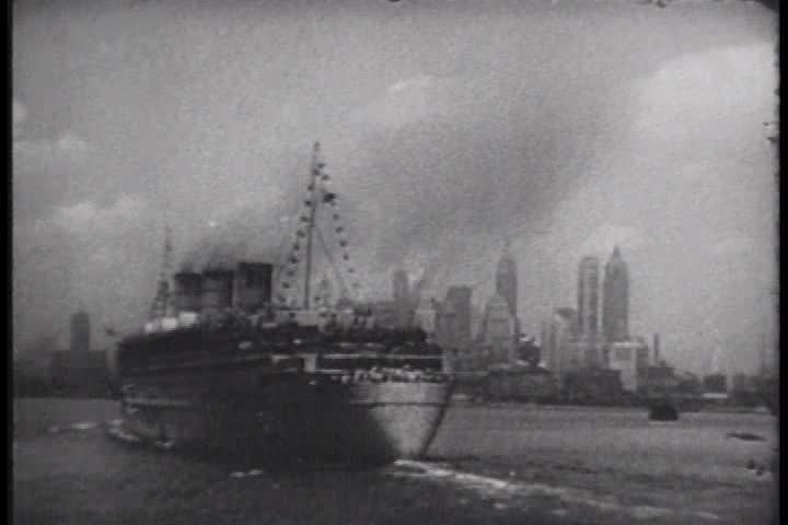 1940s - Troop ships come home to New York City in 1945 with victorious soldiers on board.