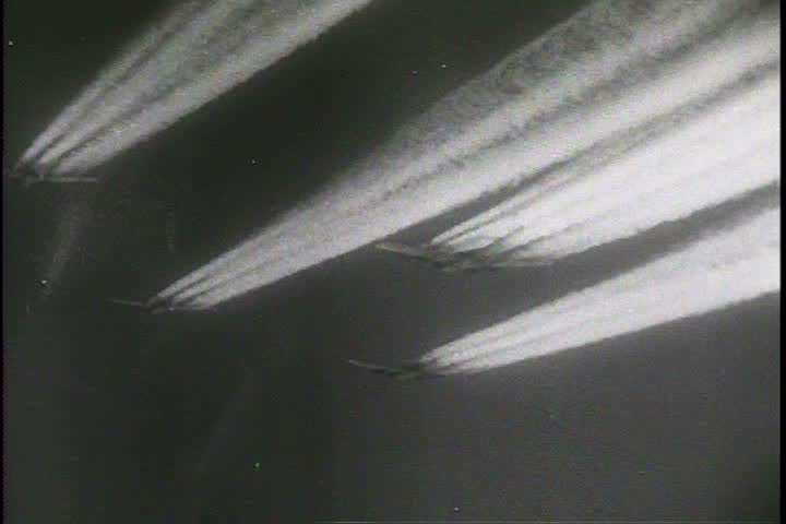 1940s - Paratroopers leap from planes during World War Two and the Korean War.