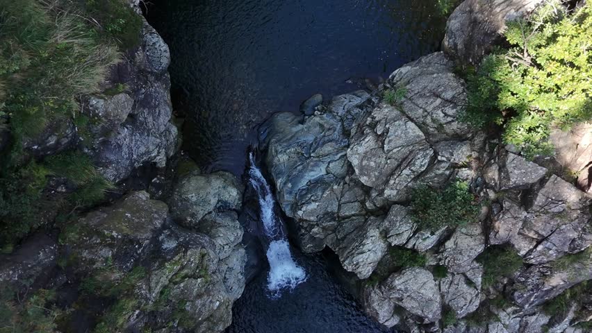 Overhead shot of two waterfalls, one of which is the Snake Waterfall (Cascata del Serpente), in the Beigua Natural Regional Park in Genoa, a UNESCO Global Geopark.