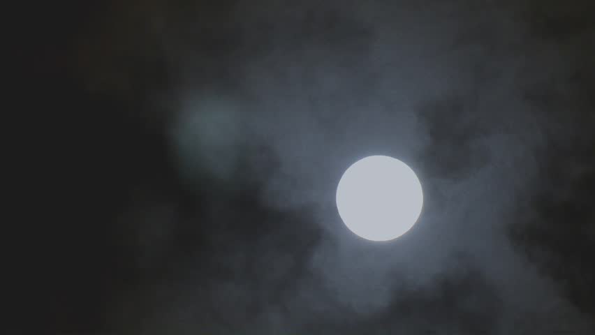 The Moon strolling among the clouds