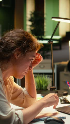 Vertical Video Devastated finance advisor looks at real time money loss and decreasing trends, stock crash causing concern for bankruptcy. Cryptocurrency market fall showcases a financial crisis