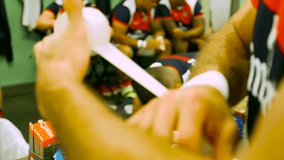 Athletes in locker room preparing for a game - Powered by Shutterstock - Get 15% off with code: PIKWIZARD15