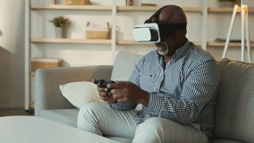 Senior man experiences virtual reality gaming at home in relaxed setting - Powered by Shutterstock - Get 15% off with code: PIKWIZARD15
