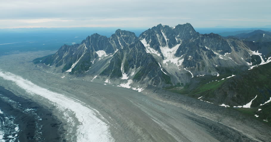 Flying above river formed by the melting waters of a glacier in Denali National Park, Alaska.