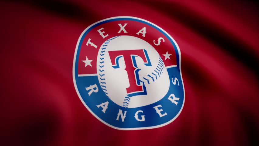 Fan waving a Texas Rangers flag in New York, USA, highlighting sports enthusiasm, baseball fandom, team spirit, and live game excitement.
