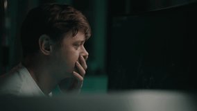 Pensive stressed stock trader studying financial charts on computer monitor, evaluating market trends with contemplative facial expression, fingers resting near lips in concentrated workspace, closeup - Powered by Shutterstock - Get 15% off with code: PIKWIZARD15