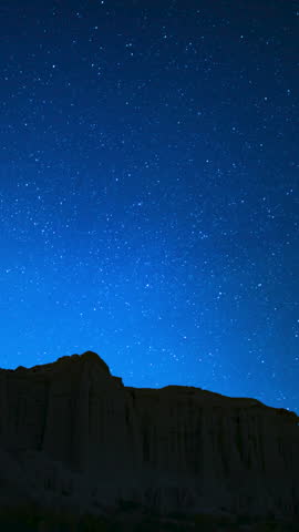 Vertical Shot of Starry Sky Polaris North Star Star Trails Above Red Rock Canyon Astrophotography Night Sky Time Lapse in California USA