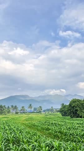 Clouds moving over mountains and agricultural areas in rural Chiang Mai, Thailand
