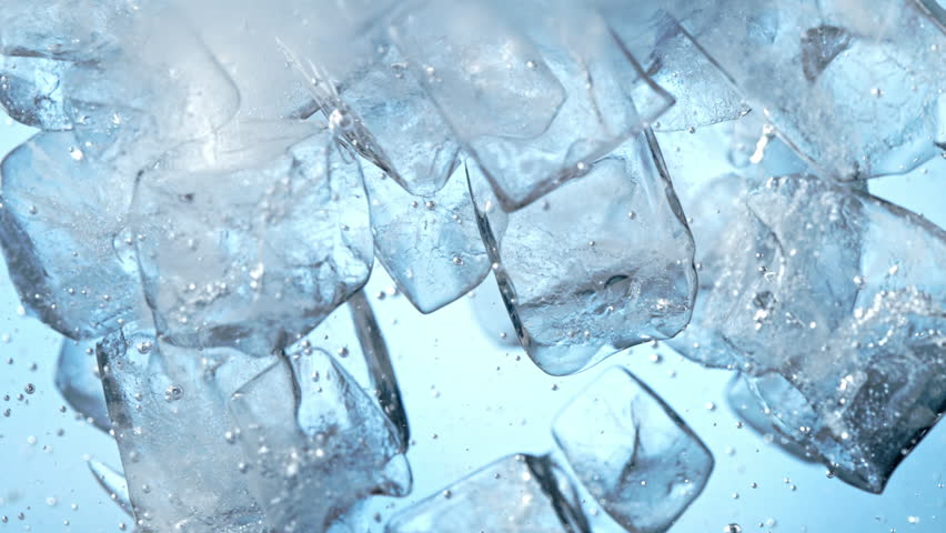 Super Slow Motion Shot of Clear Ice Cubes Flowing in Water at 1000fps.