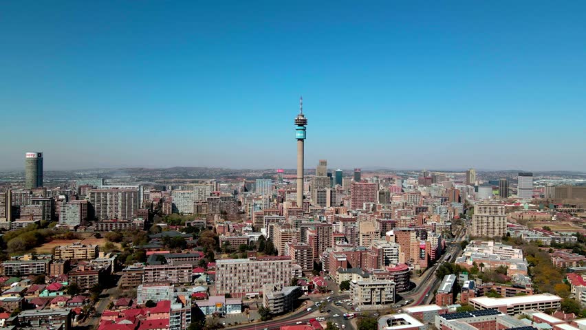 Aerial view of the vibrant Johannesburg skyline featuring the iconic Hillbrow Tower contrasted against the cityscape, Houghton Drive, Johannesburg, Gauteng, South Africa.