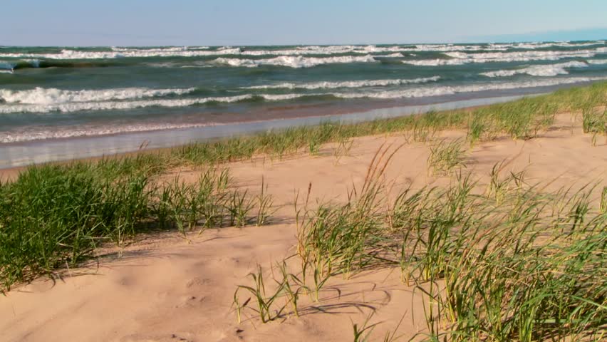 Crashing Waves On A Breeze Day At Indiana Dunes National Park, USA. Wide Shot