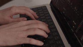 Close-up of hands typing on laptop keyboard while financial charts and digital analytics fill the screen, symbolizing modern finance and remote business solutions - Powered by Shutterstock - Get 15% off with code: PIKWIZARD15