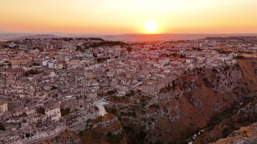 Aerial Sunset View of Rocky Landscape and Farmland near Matera, Basilicata, Southern Italy – Scenic Countryside Panorama