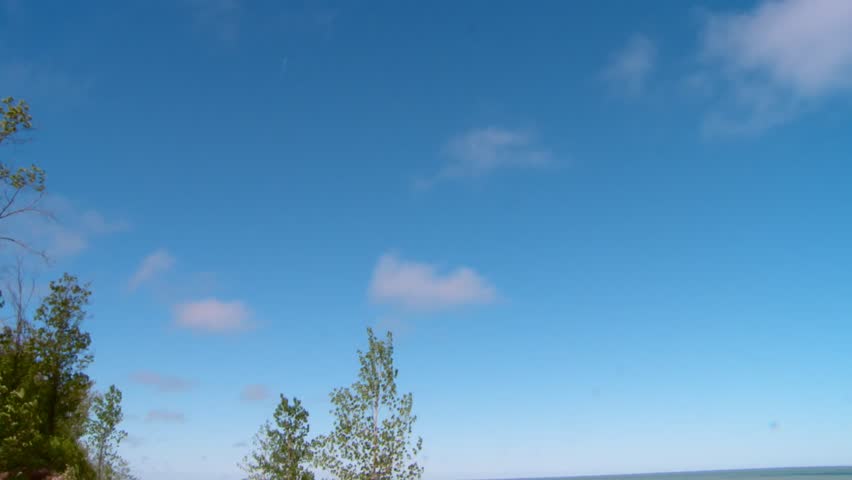 Reveal Beaches At Indiana Dunes National Park During Summer In The United States. Tilt-down Shot