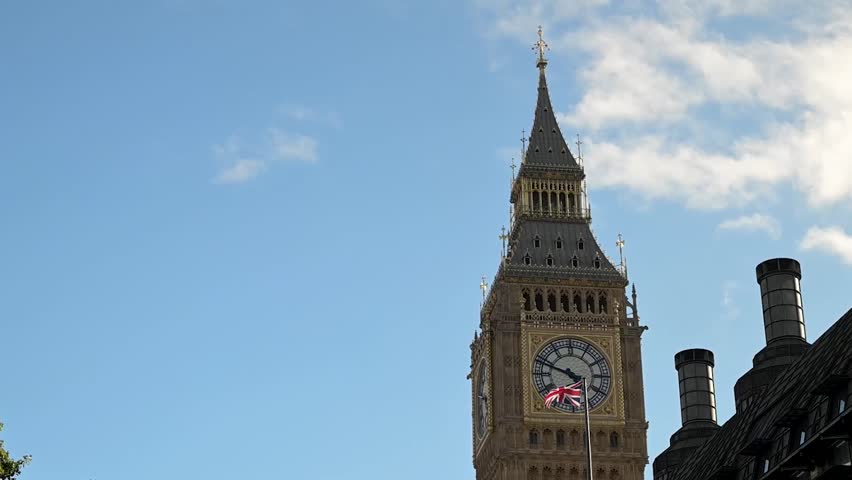 Upward view of the Elizabeth Tower, commonly known as Big Ben, beside the Palace of Westminster in London, United Kingdom.
