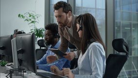 Multinational call center office conflict angry displeased Caucasian male supervisor scolds callcenter female operator African business man Indian woman working support headset tension stress problems - Powered by Shutterstock - Get 15% off with code: PIKWIZARD15