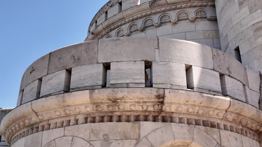 Elegant medieval-inspired architectural details of Fisherman's Bastion under a clear blue sky.