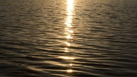 solar reflection on a surface of the water. waves on water. decline