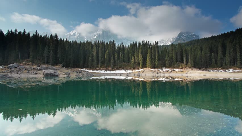 Mountain lake ladscape time lapse: Lago di Carezza in the Dolomites, South Tyrol, Italy