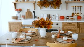 Autumn table setting with pumpkins and fall leaves, rustic kitchen background, harvest decor - Powered by Shutterstock - Get 15% off with code: PIKWIZARD15