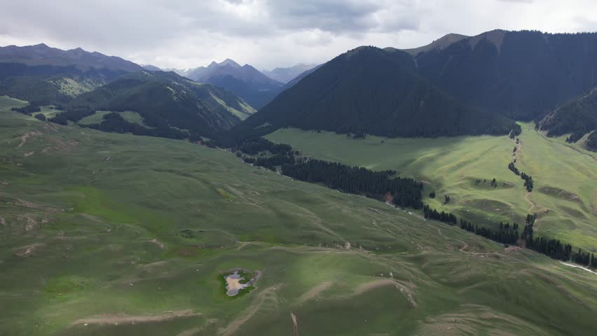 Aerial phooraphy of mountins,rassland and forests in Xinjiang Povine in western China