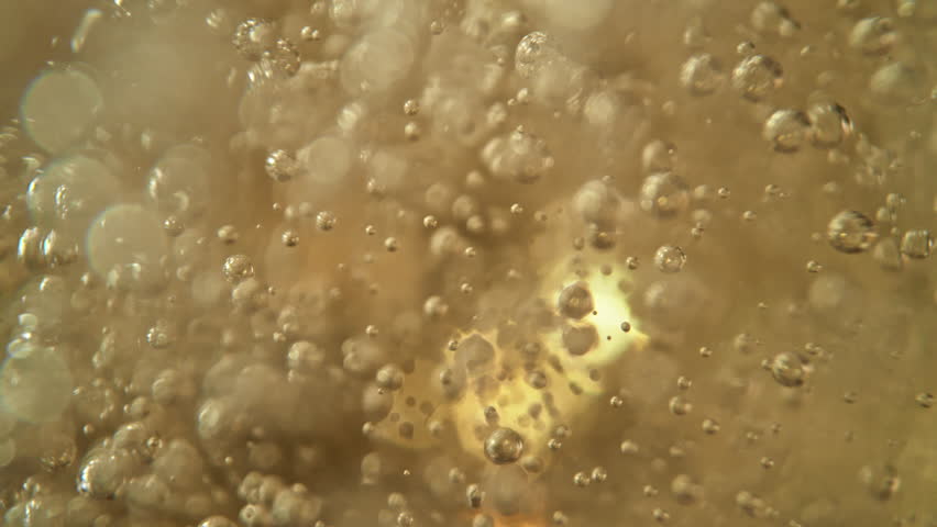 Super Slow Motion Shot of Rising Bubbles in a Fresh Sparkling Drink at 1000fps.