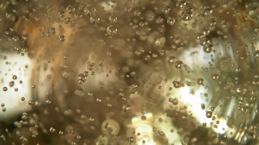 Super Slow Motion Shot of Rising Bubbles in a Fresh Sparkling Drink at 1000fps.