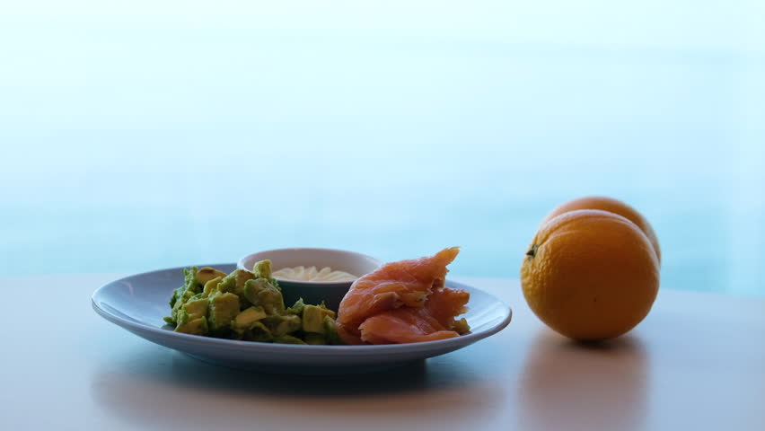 Salad ham oranges Italian prosciutto crudo with melons. Slices of traditional ham wrapped around melons. Tasty appetizer. Food background. Close up. Snack for wine for an aperitif