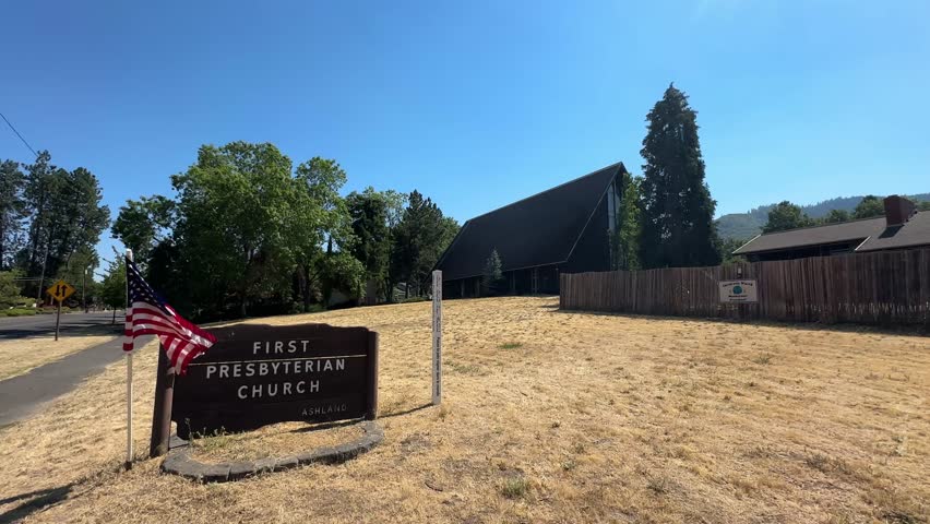 Historic church on sunny day in Ashland, Oregon, serene and peaceful view
