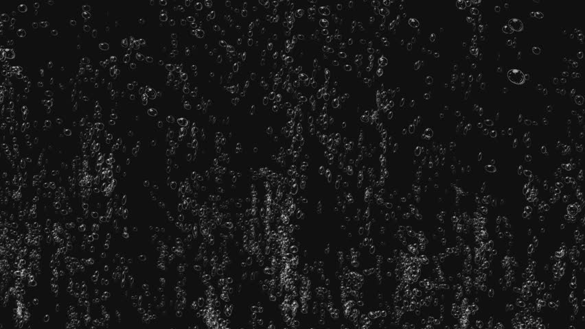 Bubbles in mineral water, slow motion.
