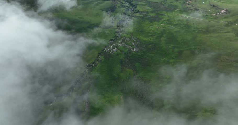 Aerial footage of beautiful high altitude grassland landscape