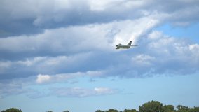 MiG-17 fighter jet flying in sky at airshow . Aviation heritage, Cold War history, military technology, aerospace engineering. Waukegan - Powered by Shutterstock - Get 15% off with code: PIKWIZARD15