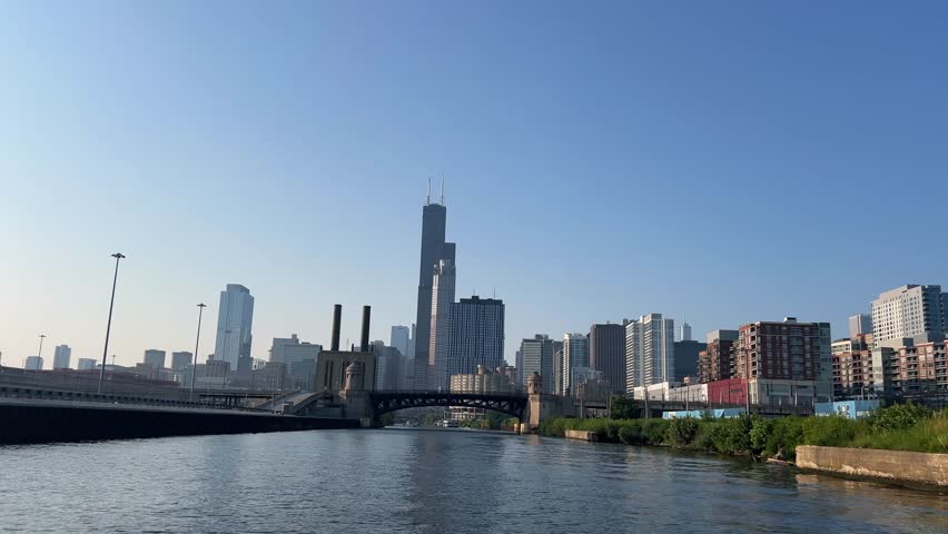 Chicago skyline with river and towers. 4K video.