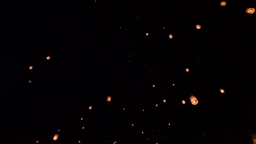 Sky lanterns with fireworks show in Loy Krathong Festival or Yi Peng Festival at Chiang Mai Thailand. The old traditions and culture of Thailand