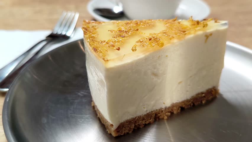 Osmanthus Flowers Cheese Cake On Stainless Steel Plate 