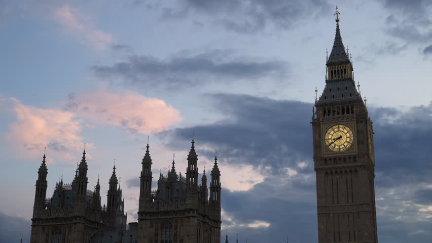 Close-up view of Big Ben illuminated at dusk in London, England