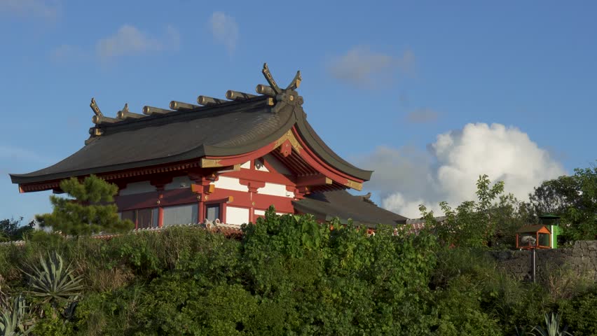 View of Naminoue Shrine and temple - 4K view of Naha, Okinawa, Japan, clear blue sky and clouds. In daytime. Summer holiday, vacation