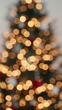 Christmas blurred glowing golden bokeh lights tree decoration festive vertical background holiday warm winter cozy atmosphere illumination sparkling celebration abstract seasonal magical design - Powered by Shutterstock - Get 15% off with code: PIKWIZARD15