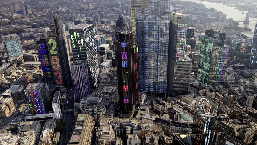 aerial view of the london city financial skyline from a helicopter with code and data mapped onto the buildings