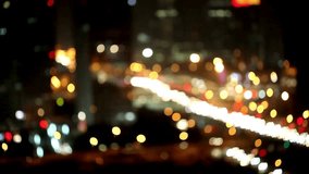 A beautiful out of focus shot of busy city traffic at night. The colorful bokeh lights create a vibrant and abstract urban background, perfect for titles. - Powered by Shutterstock - Get 15% off with code: PIKWIZARD15