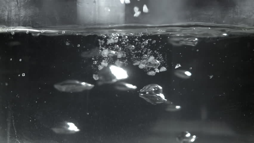 The cook salts the water in a saucepan. Filmed on a high-speed camera at 1000 fps. High quality FullHD footage