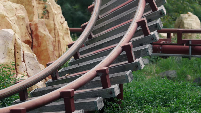 close-up view of the roller coaster tracks on which the carriage travels