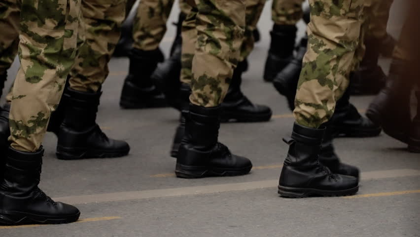 Close-up view of uniformed soldiers