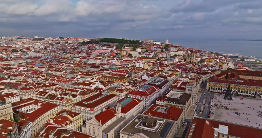  Aerial view on old center Alfama, district of Lisbon with Saint Stephen Church. Lisbon, Portugal