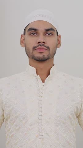 Vertical Video of Muslim Man Holding HIV-AIDS Poster